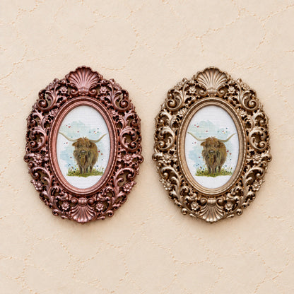 Highland Cow and Butterflies, gold and rose gold side by side